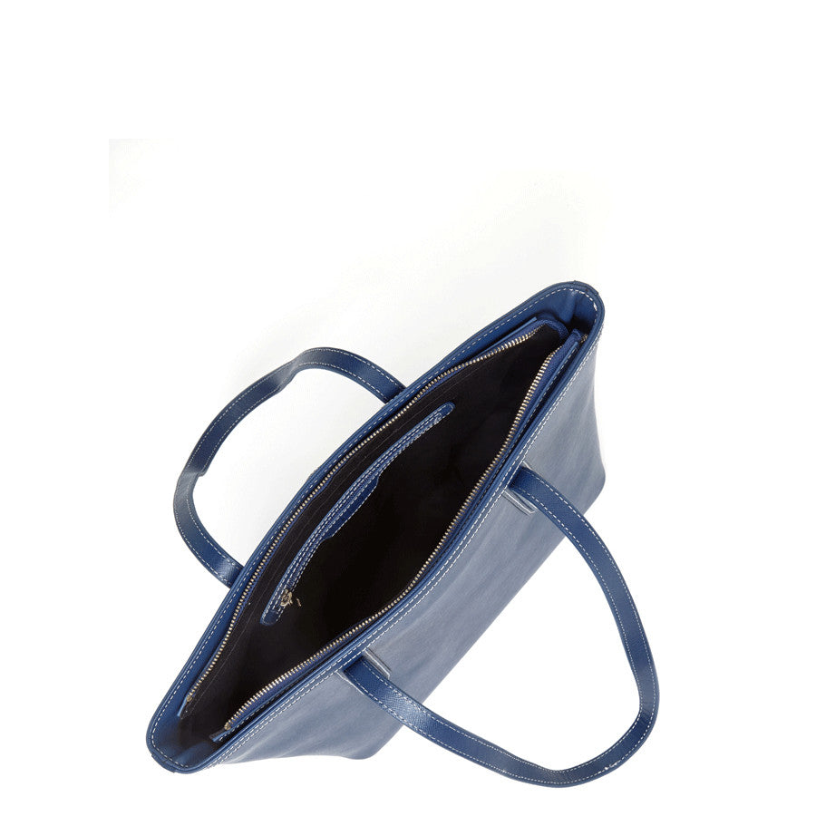 SUSU Ludlow blue leather bag interior showing black lining and zippered pocket