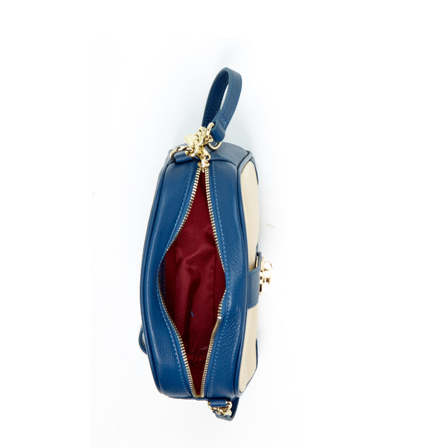 SUSU bag interior showing red fabric lining and organizational pockets
