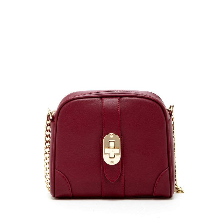 SUSU Baxter burgundy leather crossbody bag with gold twist lock and chain strap