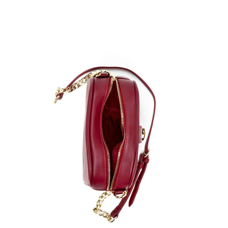 SUSU Baxter burgundy bag interior showing red lining and cell phone compartment