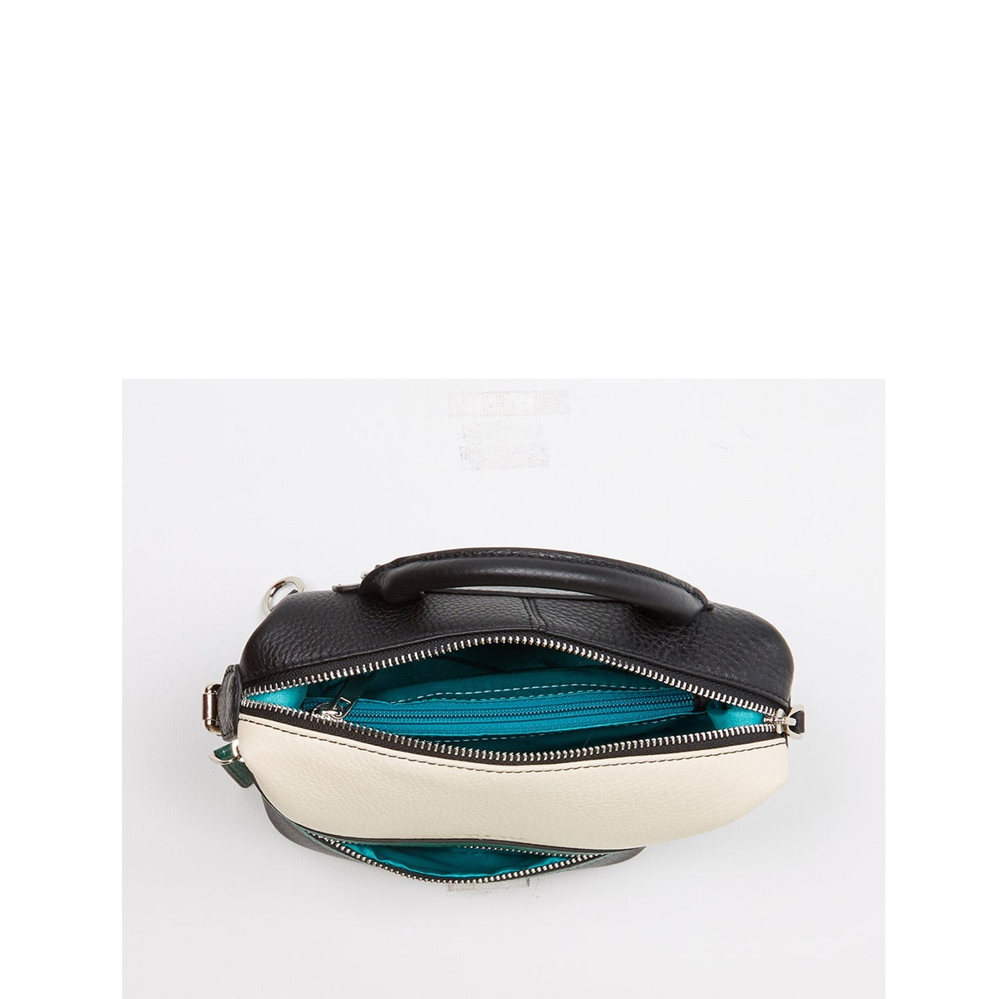 SUSU Ashley tri-color leather backpack interior showing turquoise lining and cell phone slot