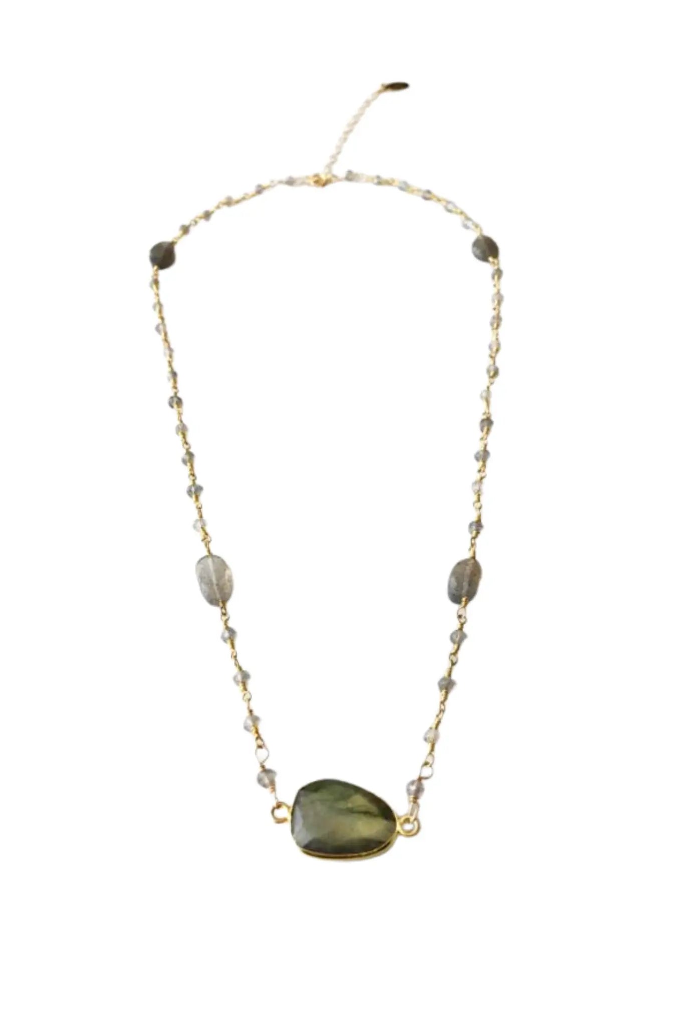 Mrs. Parker Necklace with green stone pendant on a white background