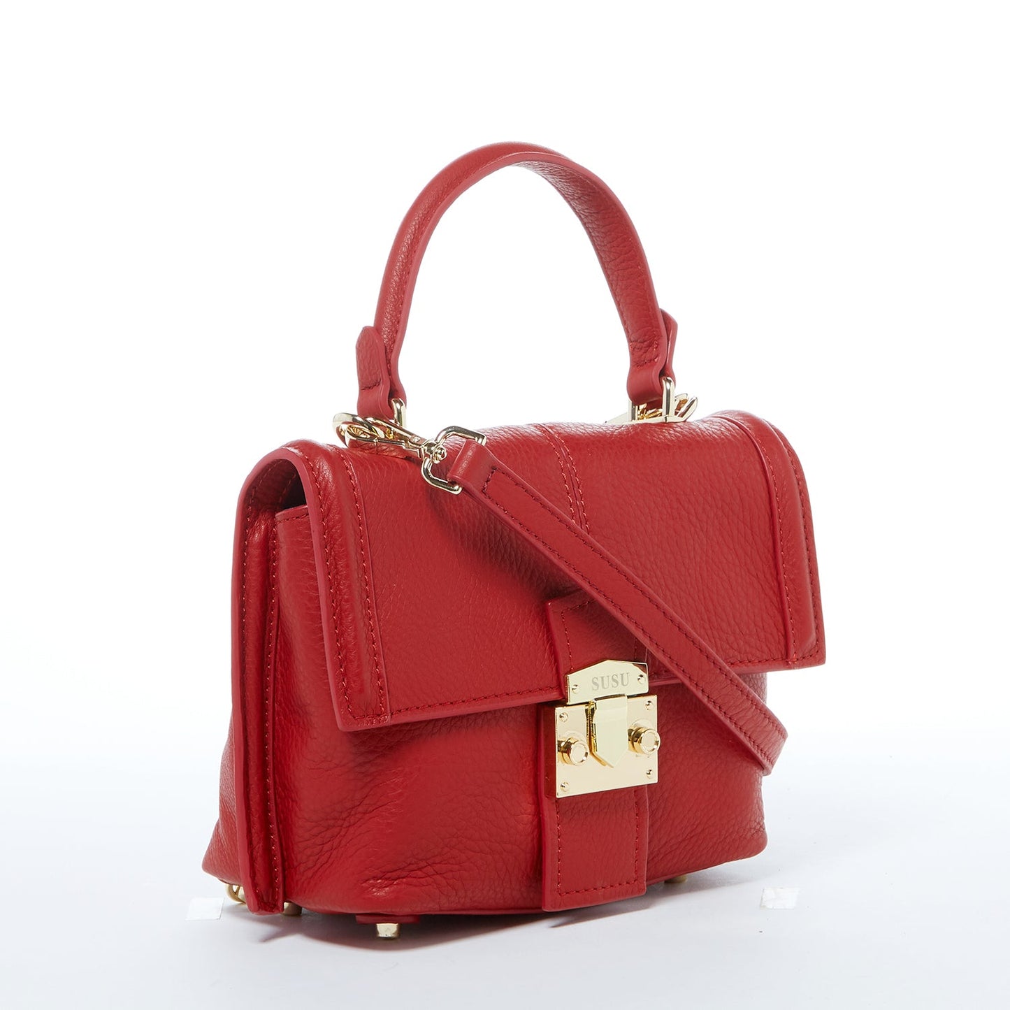 SUSU red Italian pebble leather texture detail showing premium leather quality