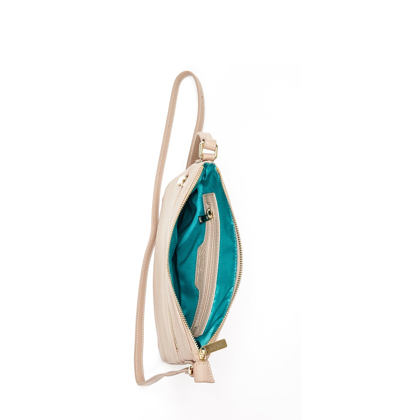 SUSU Saxon beige leather bag interior showing teal cotton lining