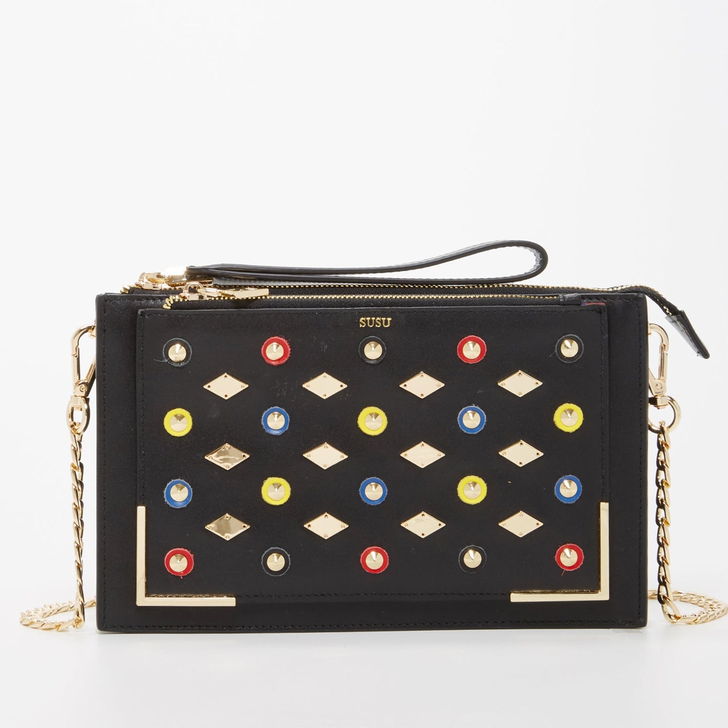 SUSU Austin black studded crossbody clutch with gold appliqués and chain strap