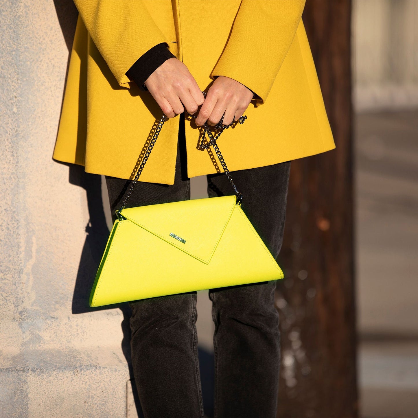 SUSU yellow clutch carried as evening purse with chain strap
