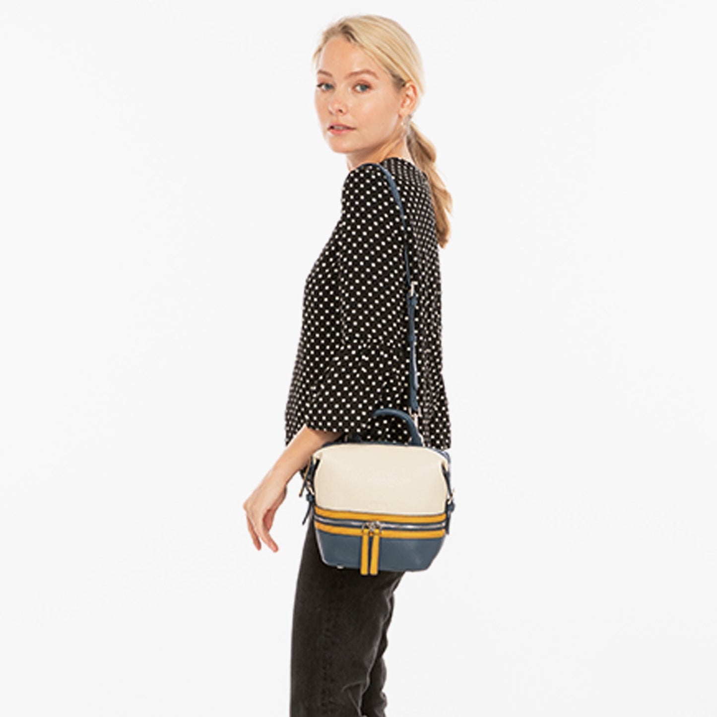 SUSU Ashley backpack worn as convertible purse with adjustable straps