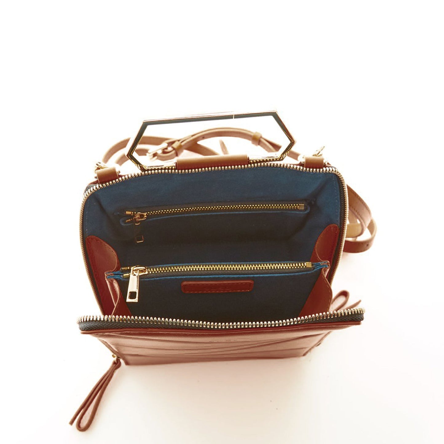 SUSU Heidi brown leather backpack interior showing teal lining and 3 compartments