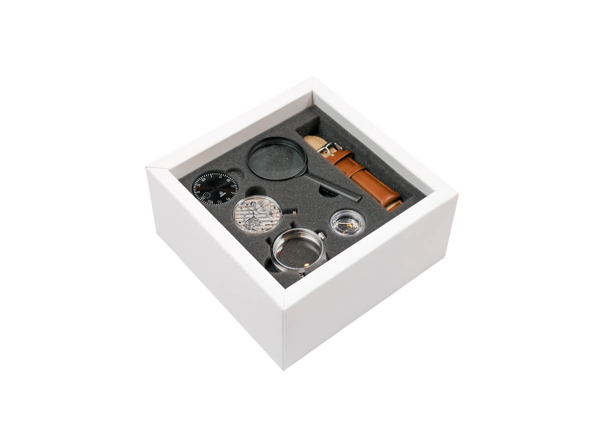 Rotate Wright watchmaking kit components showing ETA movement and all parts included