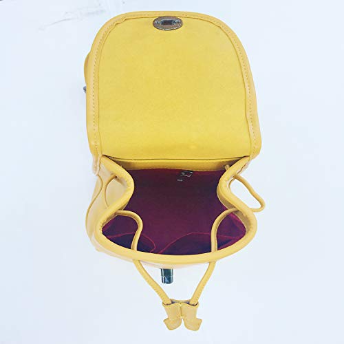 SUSU yellow leather backpack open showing spacious main compartment capacity
