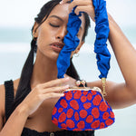ARNOLDI Mandy Hand - beaded Clutch, in Savoy Blue & Red - Diazza