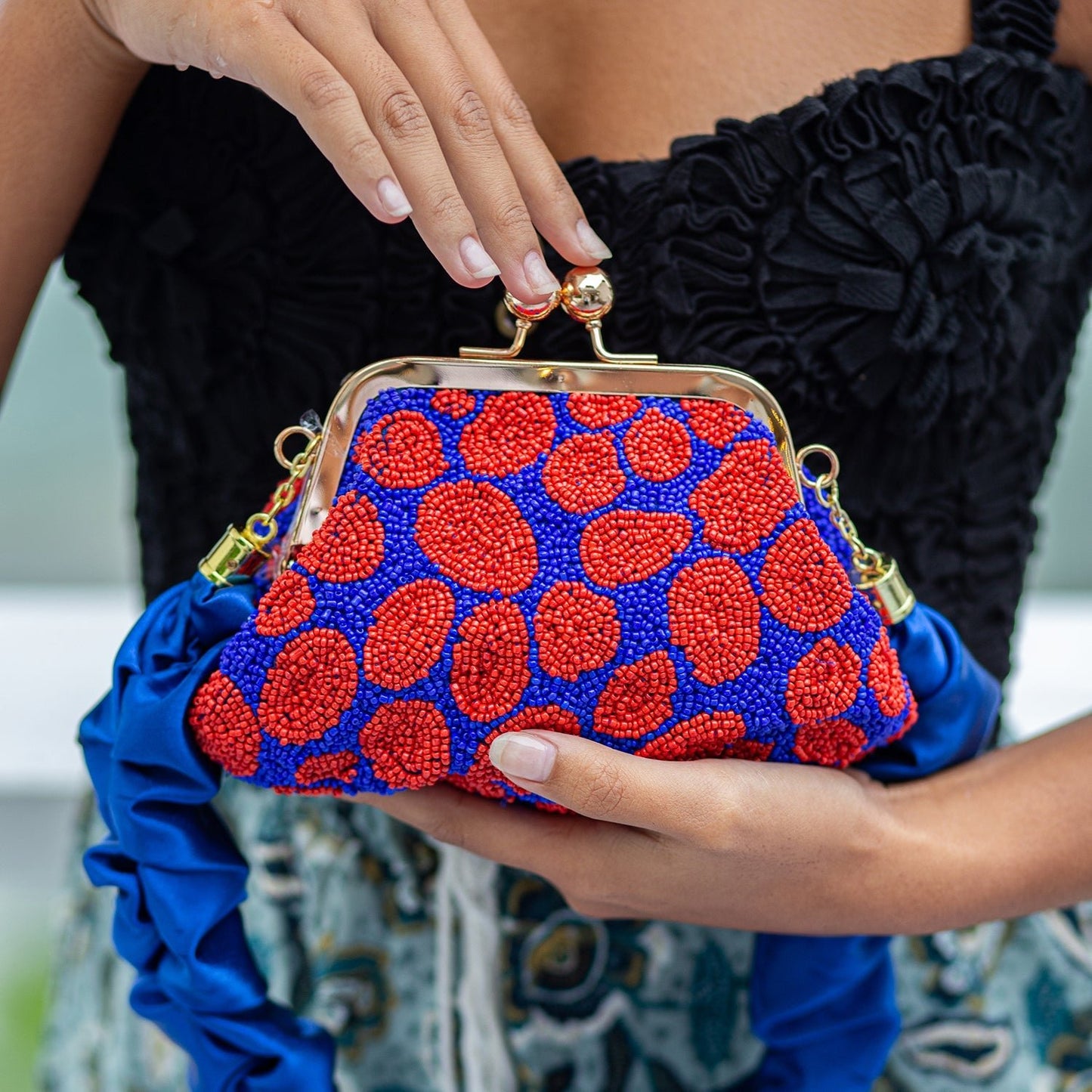 ARNOLDI Mandy Hand - beaded Clutch, in Savoy Blue & Red - Diazza