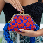 ARNOLDI Mandy Hand - beaded Clutch, in Savoy Blue & Red - Diazza